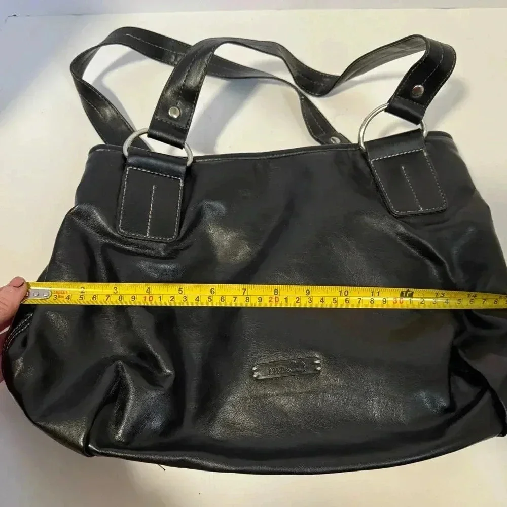 Nine  and Co  black leathe purse